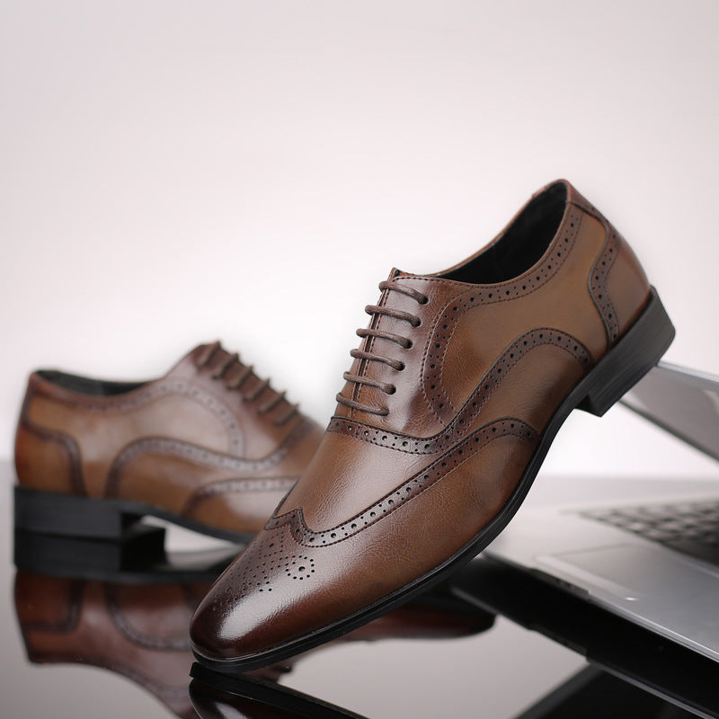 Side profile of classic men's brown Oxford brogue dress shoes, emphasizing sophisticated lines.
