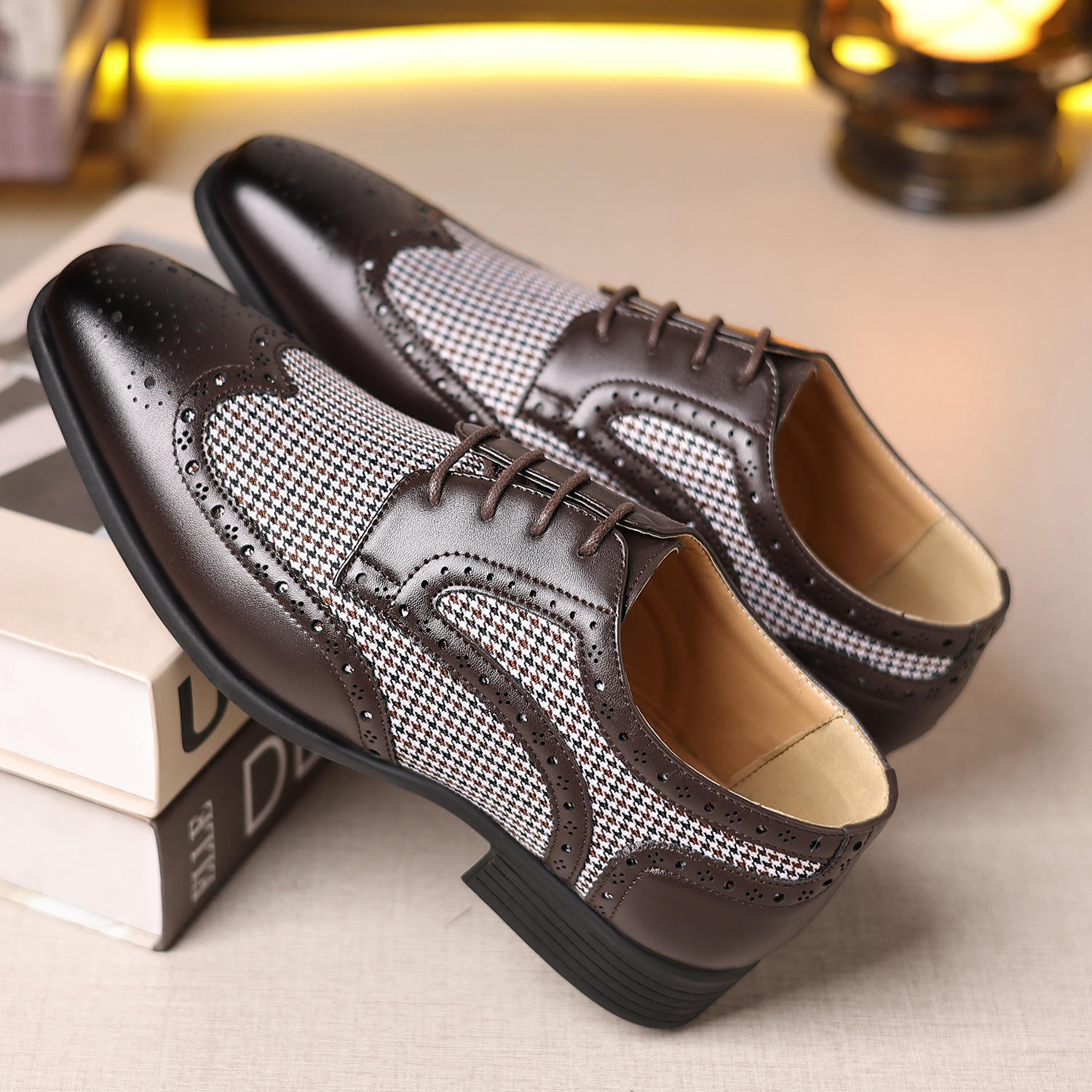 Elegant men's work shoes: wingtip design, polished leather, and timeless brogue details.