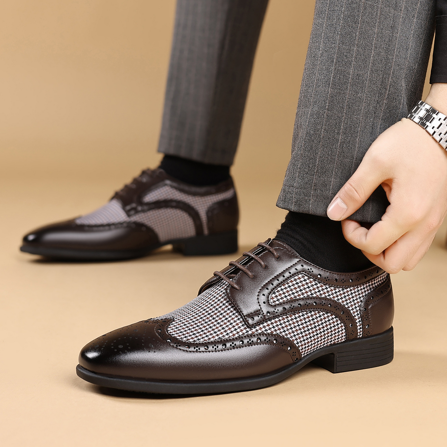 Classic men's wingtip business shoes, sleek design and comfortable for all-day formal wear.
