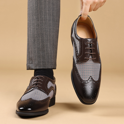 Men's stylish formal footwear: wingtip pattern, high-quality leather, and durable sole.