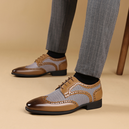 Stylish men's formal wingtip shoes in a versatile color, perfect for dressy business wear.