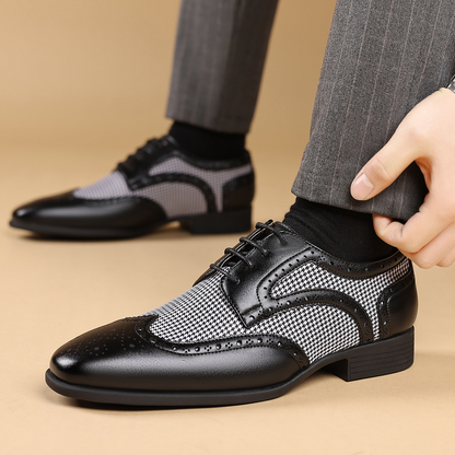 Stylish men's wingtip dress shoes in polished leather, ideal for special occasion and office wear.