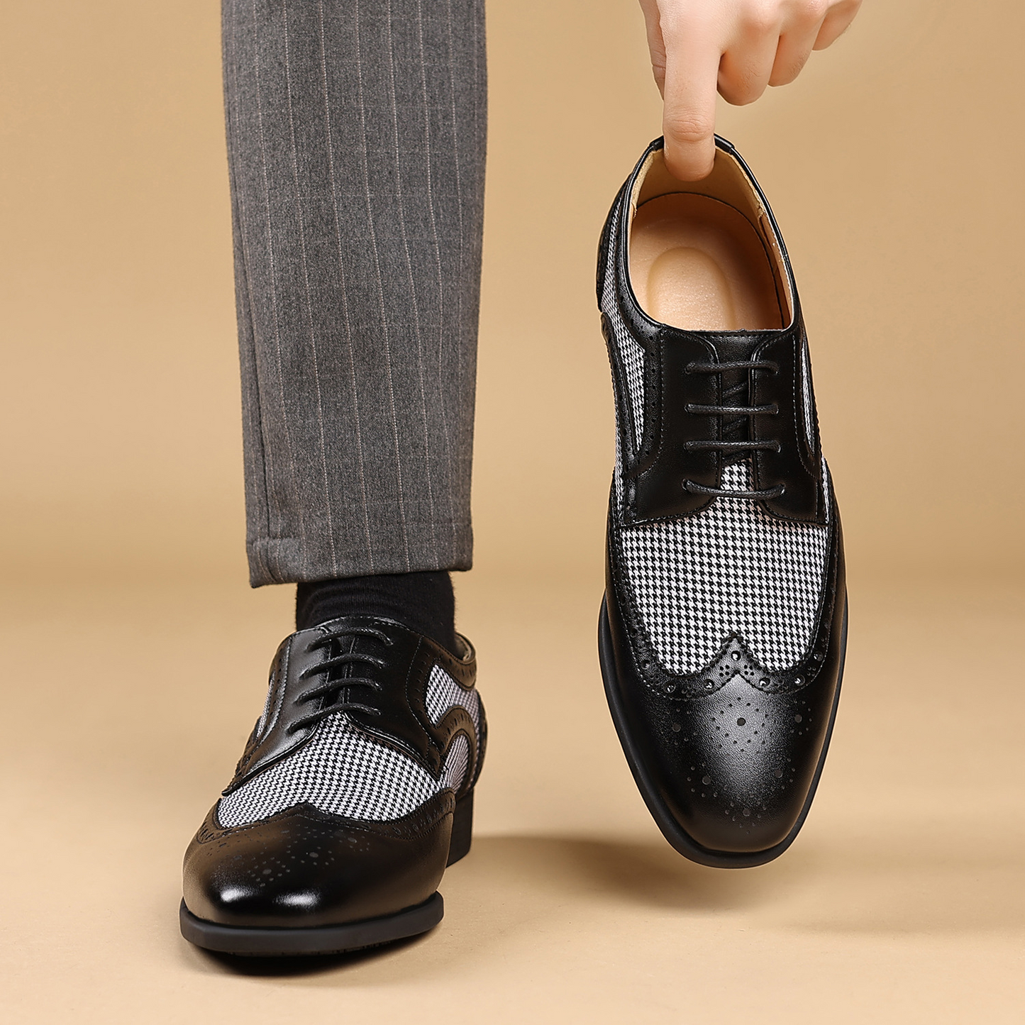 Premium leather wingtip dress shoes for men, offering sophisticated style and comfortable fit.