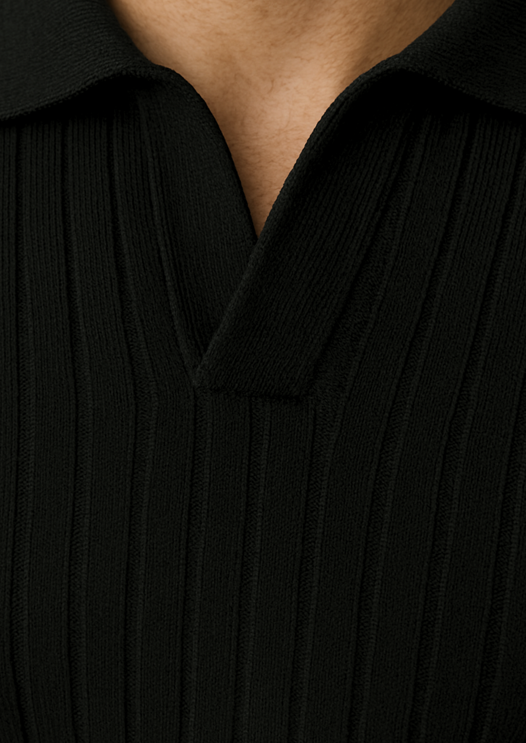 Versatile men's black polo sweater with an open collar, perfect for stylish smart casual occasions.