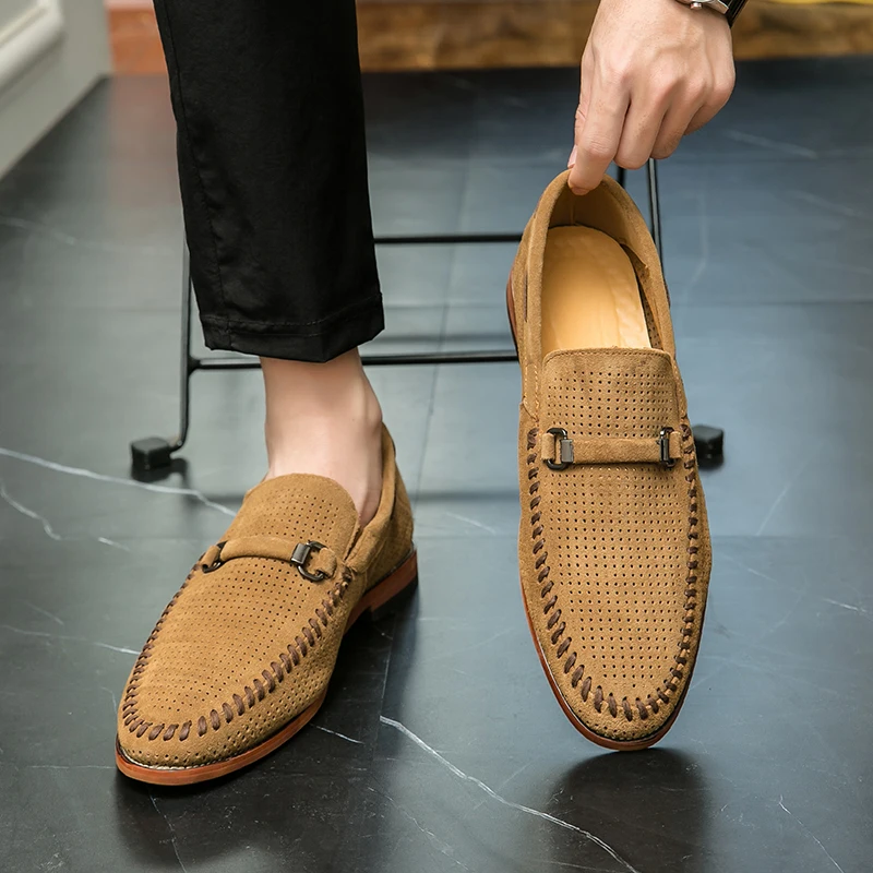 Men's slip-on perforated loafers in brown, comfortable for all-day wear.
