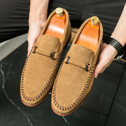 Breathable men's dress loafers, perforated for air circulation, ultimate comfort.