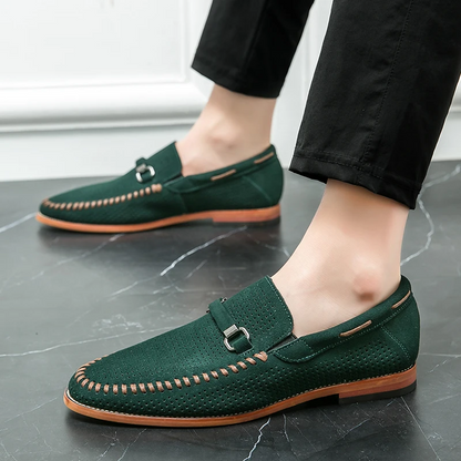 Everyday men's shoes, brown slip-on loafers, perforated for breathability.