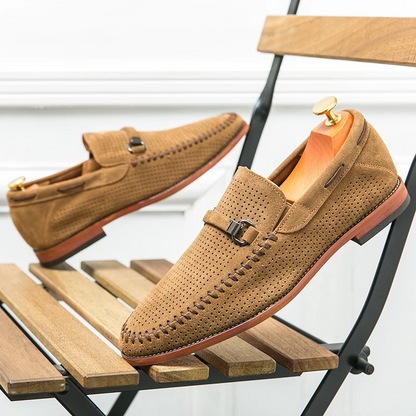 Stylish brown men's loafers, perforated for comfort & breathability, versatile.
