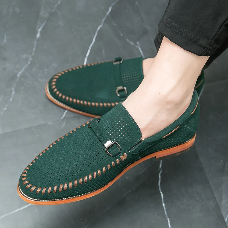 Stylish tan men's slip-on loafers, casual yet refined, with perforated accents.