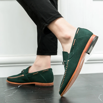 Comfortable men's navy perforated loafers, perfect for versatile daily style.