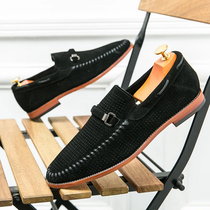 Stylish men's black perforated loafers, comfortable and easy to slip on.