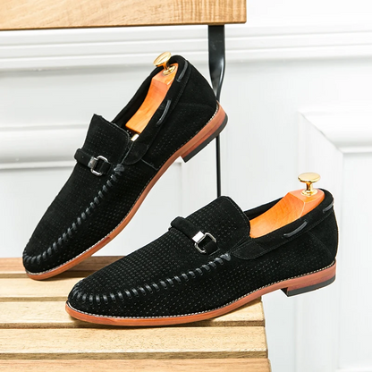Comfortable brown men's slip-on loafers, perforated for ultimate foot breathability.