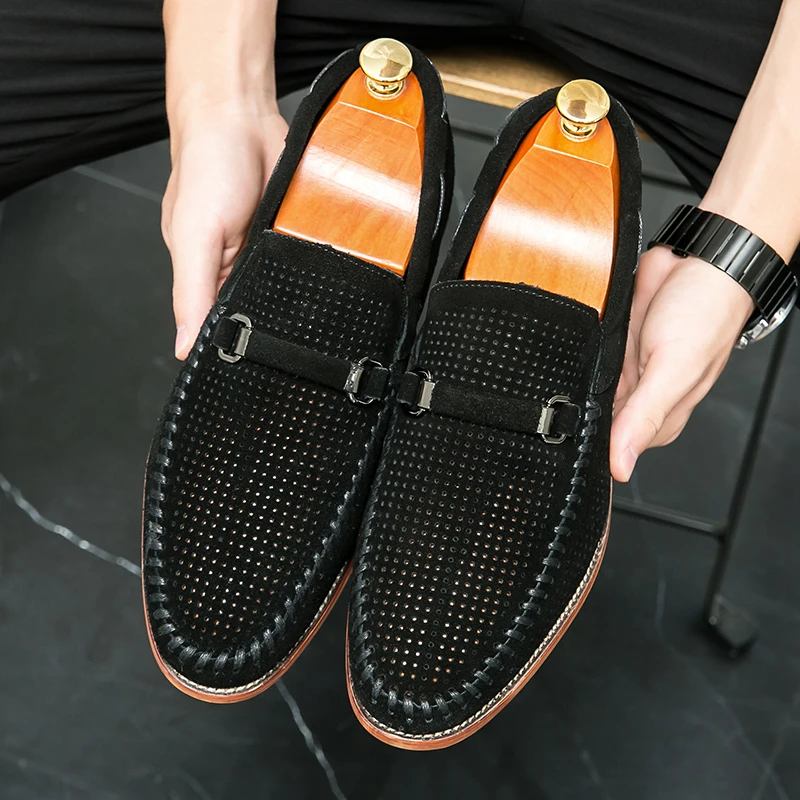 Stylish men's perforated slip-on loafers, navy, ideal for casual and semi-formal.