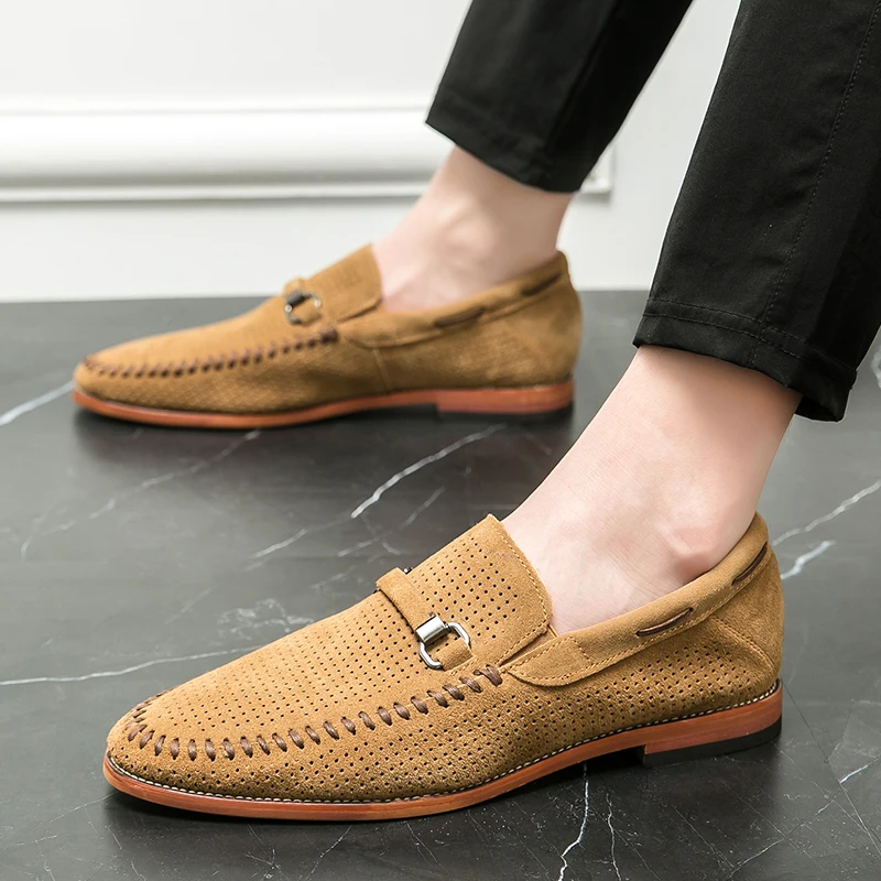 Perforated black slip-on loafers for men, offering superior foot comfort & style.