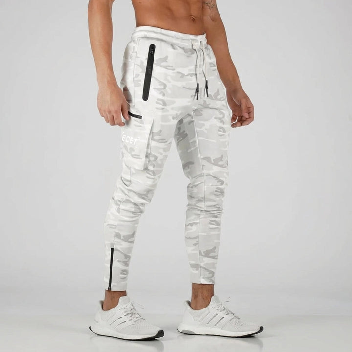 Hector men's tapered athletic joggers for sportswear. Drawstring waist & zip pockets for urban style.