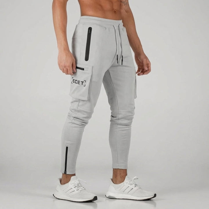Hector men's performance training pants. Sporty joggers with secure zip pockets for all your essentials.