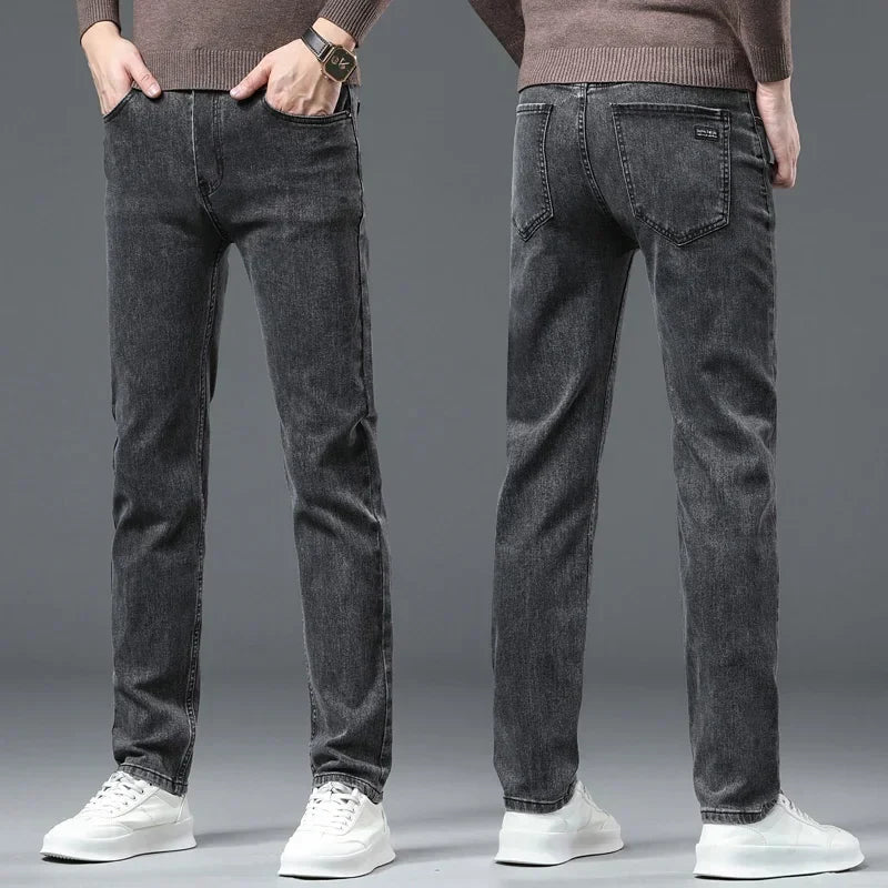 Premium men's straight-leg jeans in classic black denim. Durable cotton blend for lasting casual style.