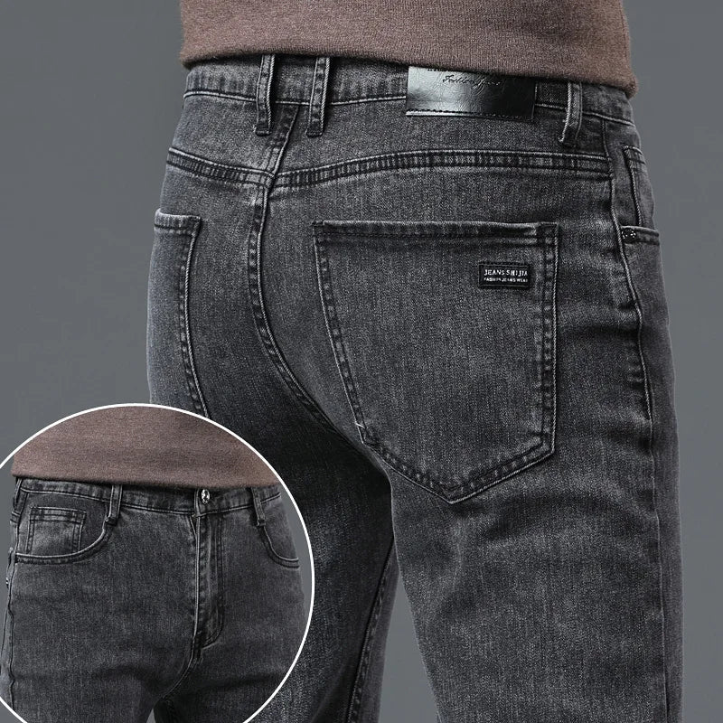 Modern men's straight-leg stretch denim jeans in a sleek gray finish. Perfect for everyday casual outfits.