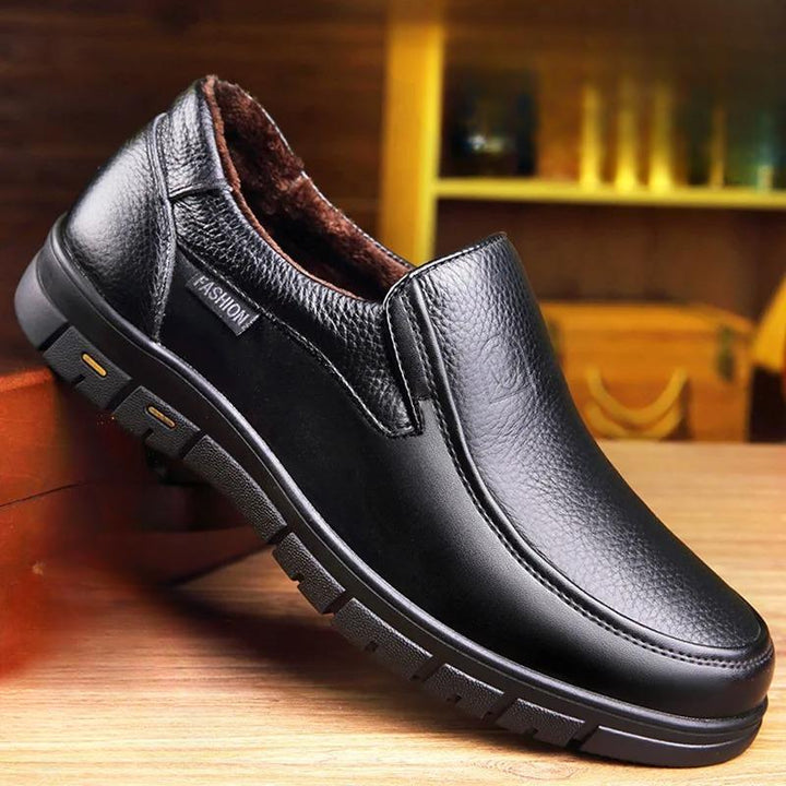 Navy blue men's slip-on loafers, a versatile choice for casual men's fashion and everyday comfort.