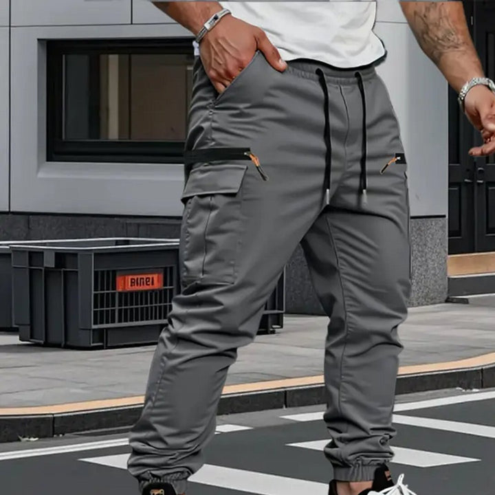 Versatile men's stretch cargo joggers with multiple pockets, blending comfort, style, and practicality for all men.