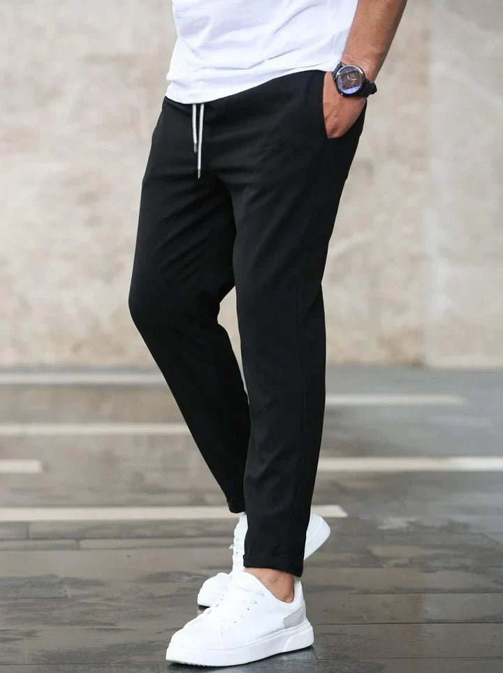 Khaki men's slim fit stretch drawstring chino pants, ideal for everyday comfort & casual style.