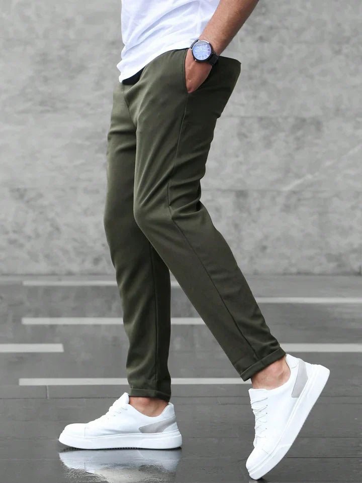 Modern men's stretch drawstring chino pants, slim fit design for ultimate comfort & style.