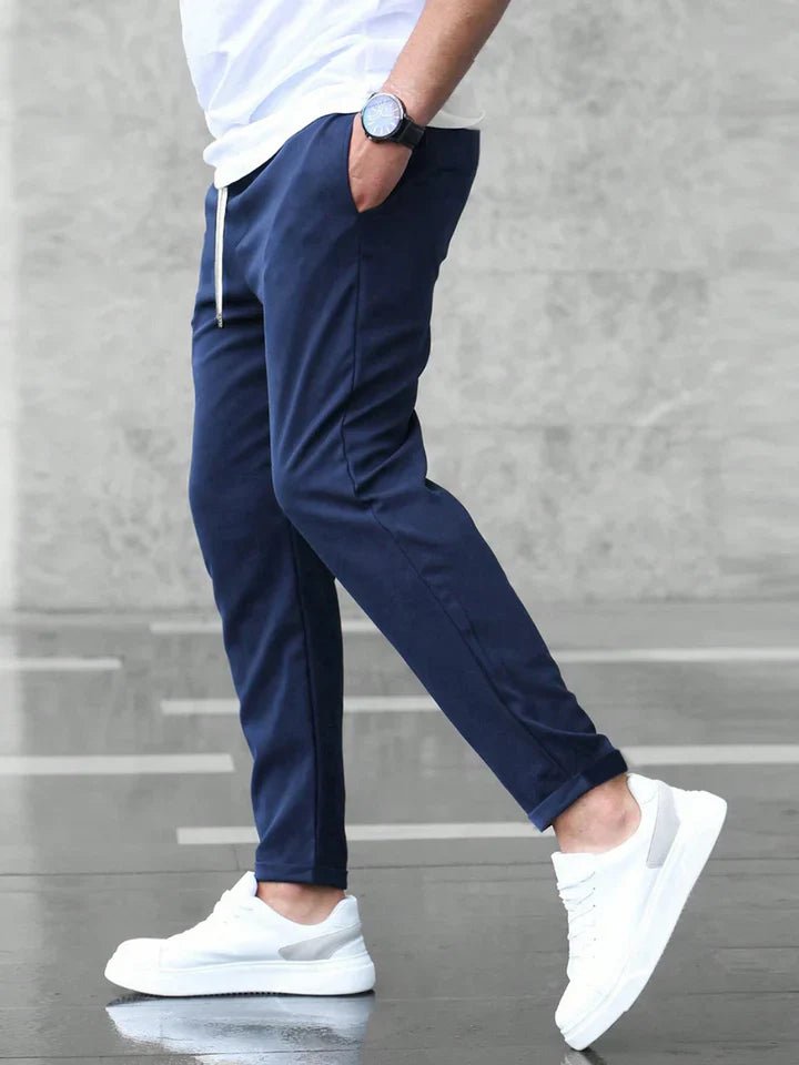 Black men's comfortable stretch drawstring chino pants, slim fit for ultimate casual style.