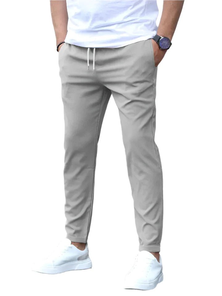 Blue men's stretch drawstring chino pants, slim fit for ultimate comfort & versatile modern style.