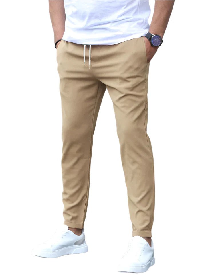 Green men's slim fit stretch drawstring chino pants, perfect for versatile comfort & casual style.