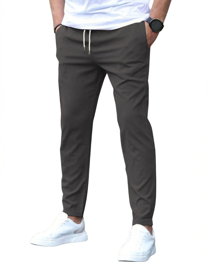 Comfortable men's slim fit drawstring chino pants, stretch fabric for casual everyday style.