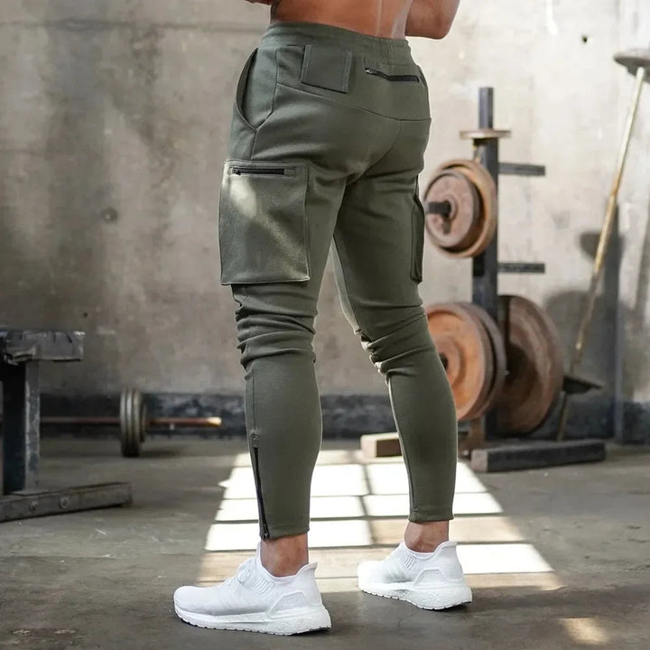 Black tactical cargo joggers for men, breathable, sweat-wicking for intense training sessions.