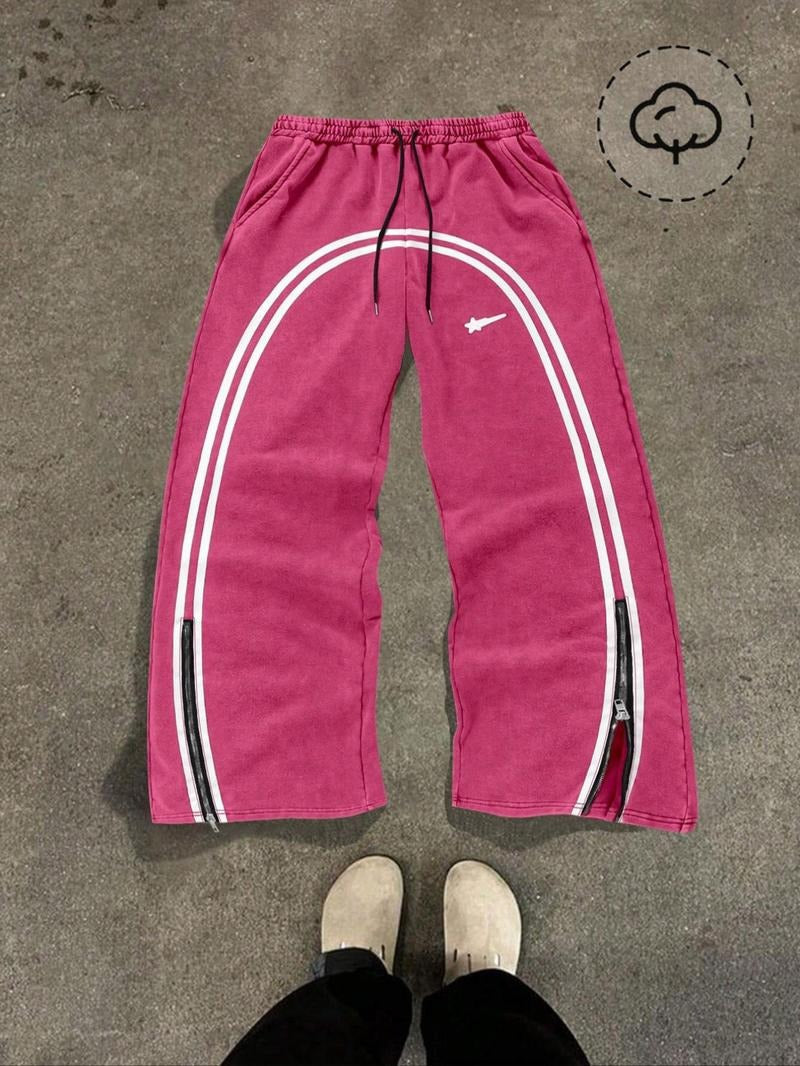 Comfortable men's black joggers with zip hems, ideal for lounging, gym workouts, or everyday athletic style.