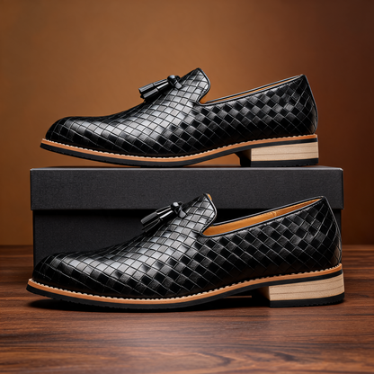 Elegant men's black tassel loafers, pointed toe slip-on shoes that combine casual footwear comfort with formal appeal.