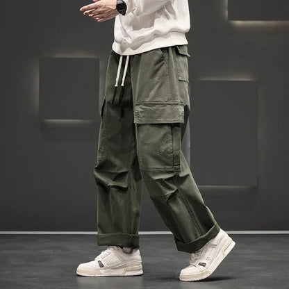 Comfortable men's cargo pants in olive, featuring a relaxed fit and an adjustable drawstring waist.