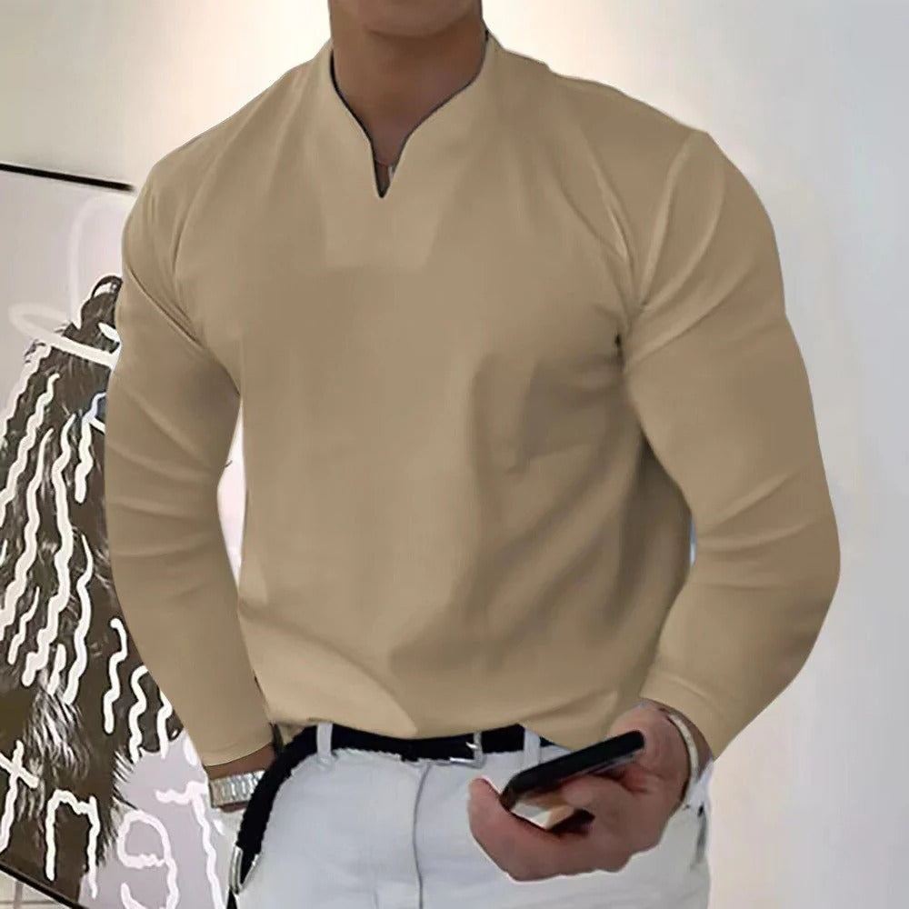 Men's V-neck sweatproof shirt on hanger, highlighting its sleek design, moisture-wicking properties & comfort.