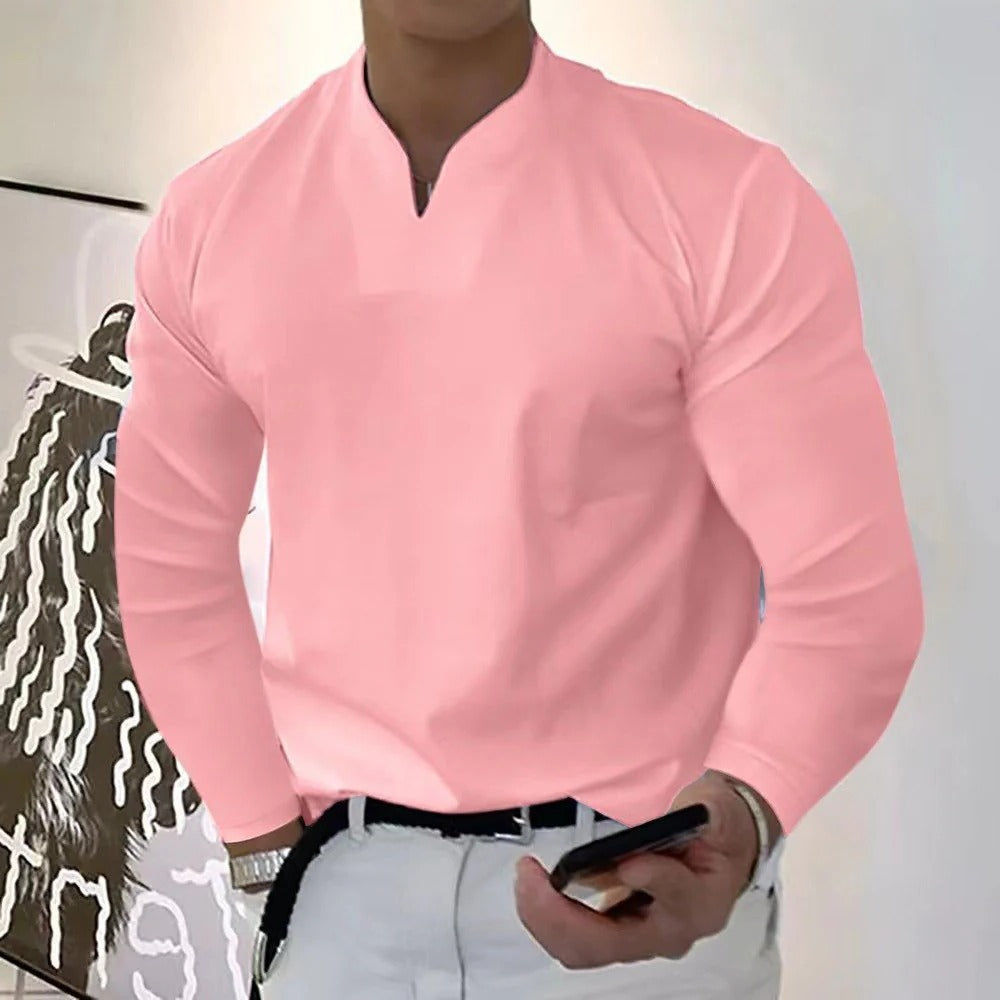 Man enjoying summer in comfortable V-neck sweatproof shirt, perfect activewear for outdoor casual style.