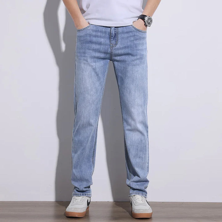 Comfortable men's blue stretch core denim jeans, classic and durable for all-day casual wear.