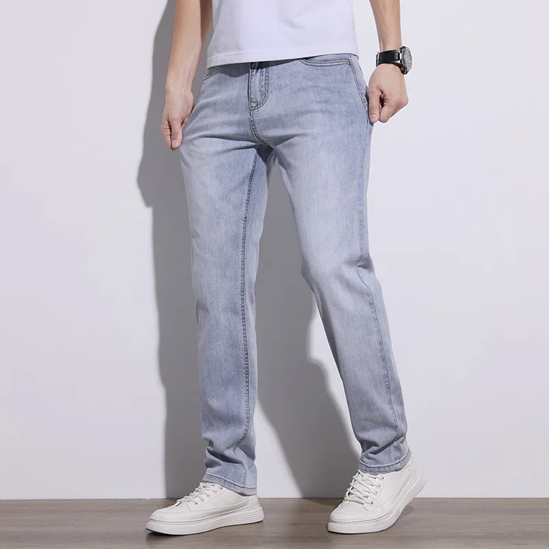 Close-up of durable stretch denim fabric on men's blue jeans, engineered for comfort and flexibility.
