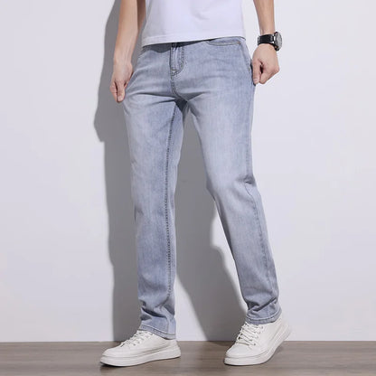 Close-up of durable stretch denim fabric on men's blue jeans, engineered for comfort and flexibility.