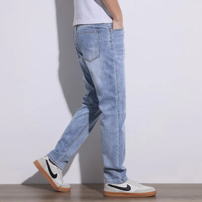 High-quality gray men's stretch denim jeans, offering core comfort and durable style for everyday outfits.