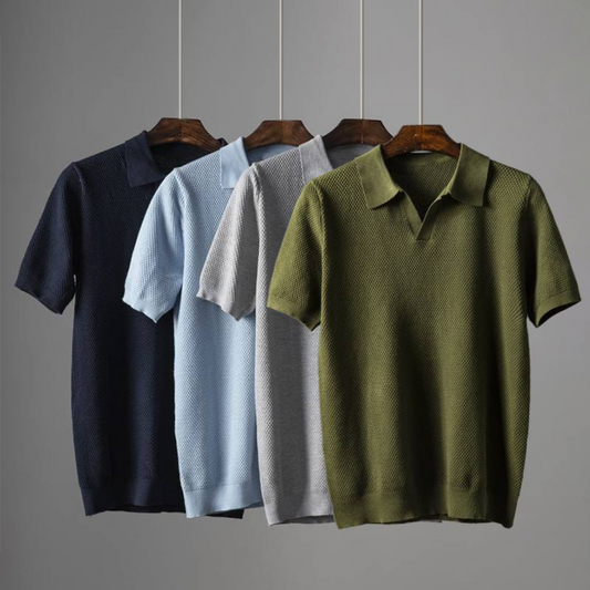 Men's blue waffle knit polo shirt, modern tailored fit, showing breathable fabric texture.
