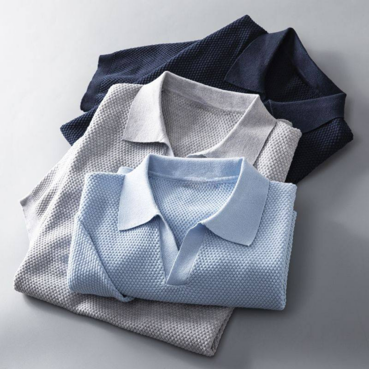 Men's short-sleeve waffle knit polo, featuring comfortable stretch and tailored silhouette.