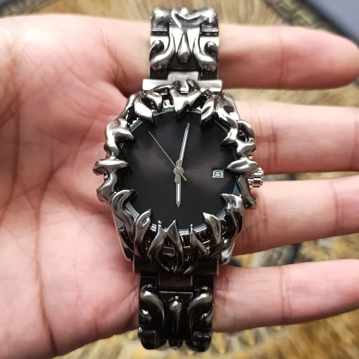 Men's durable flame steel watch with sculpted bezel. Waterproof, quartz movement, a bold and unique metal timepiece.