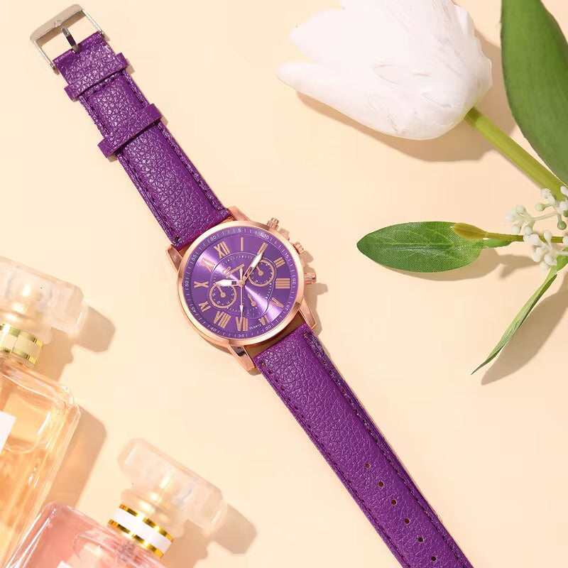 Fashionable men's statement piece: a gold-tone chronograph watch with classic Roman numeral display.