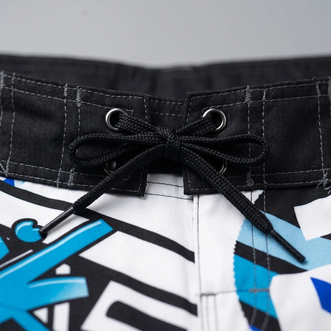 Men's quick-dry boardshorts with a bold geometric print, perfect for active swimming & beach.