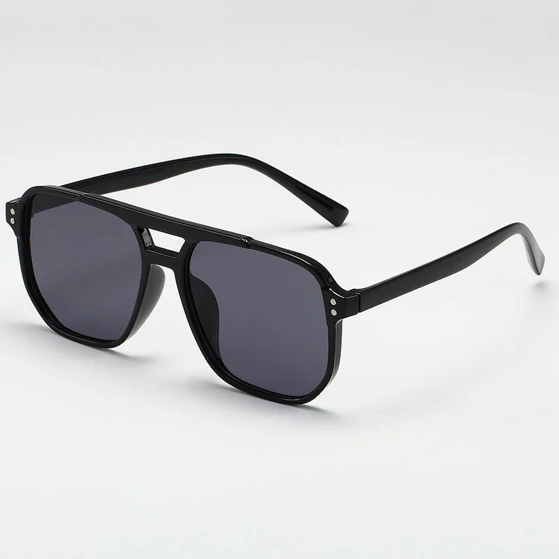 Durable men's UV400 sunglasses for complete eye protection. Bold, stylish & lightweight fashion accessory.