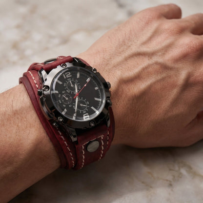 Classic men's oversized watch with a distressed brown vintage leather strap. Bold retro casual statement.