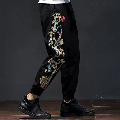 Stylish men's khaki embroidered pants featuring a unique Bonsai design. Perfect for modern streetwear.