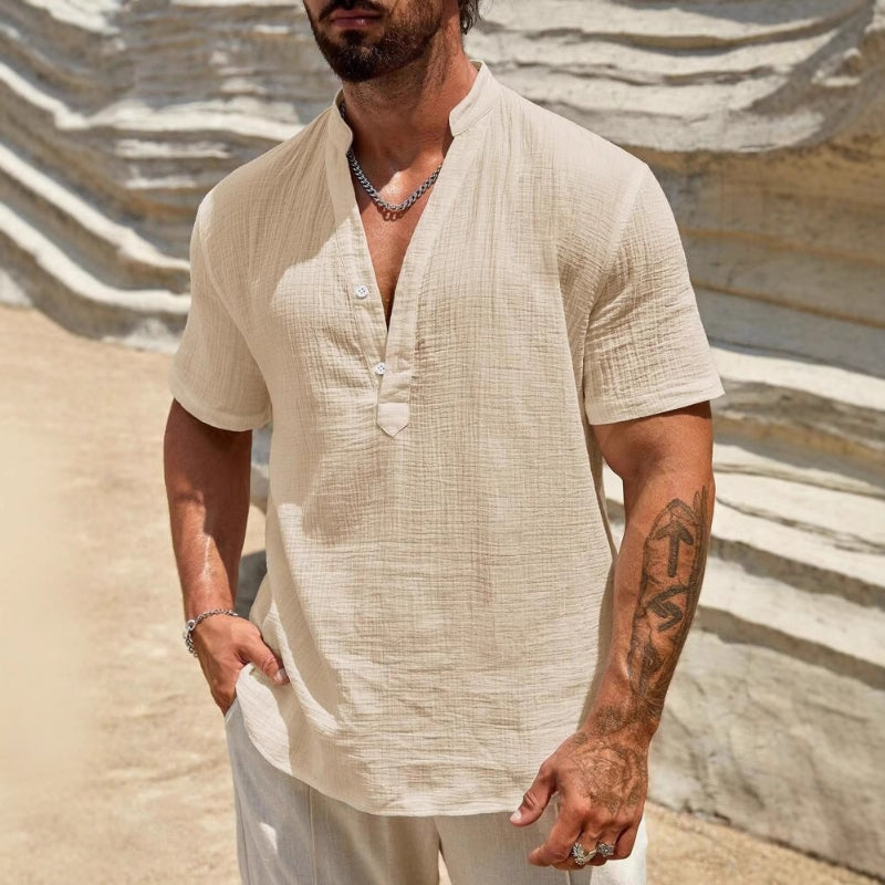 Breathable men's polo shirt in a relaxed fit. Casual short sleeve top with button placket for summer style.