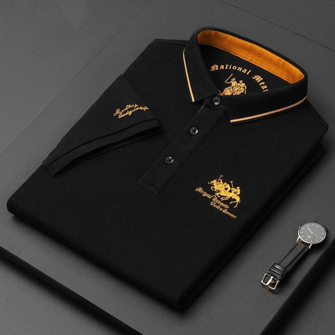 Textured shot of the breathable fabric on a men's embroidered polo top, emphasizing summer comfort & versatility.